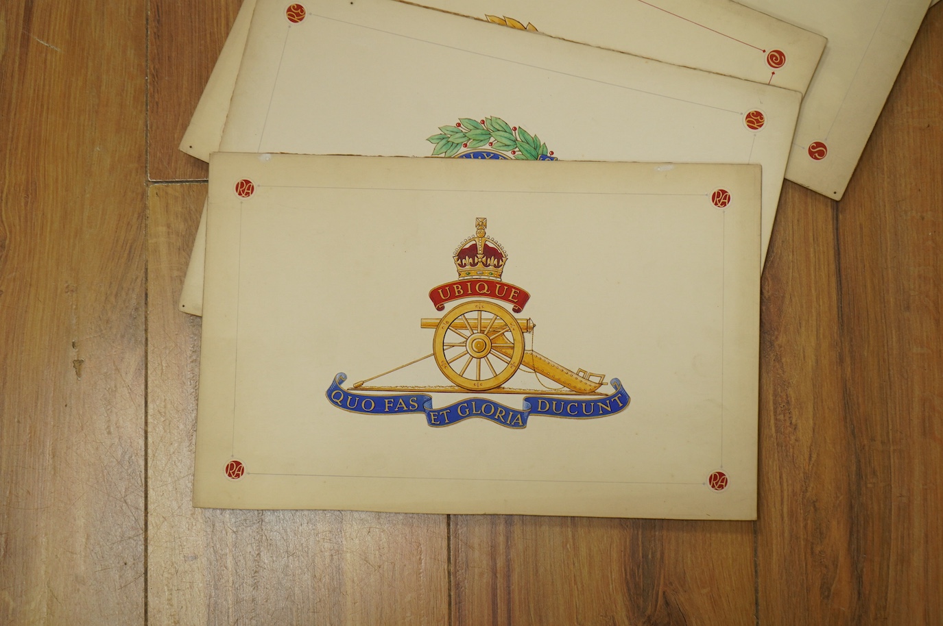 A set of five original WWII watercolours for postcard designs, Badges of the Services to include ‘Royal Artillery’, ‘Royal Engineers’ and ‘’Royal Army Medical Corps’, unsigned, unframed, 18 x 29cm. Condition - fair
